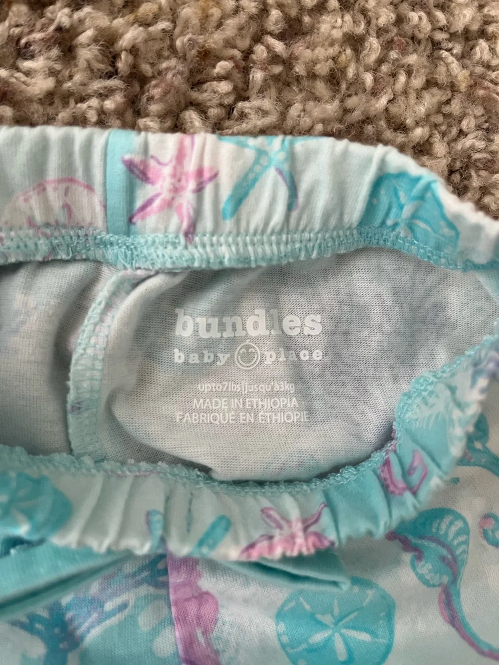 The Children’s Place Newborn 5 Bodysuits & 3 Shorts Set in Pastel Seashell Print